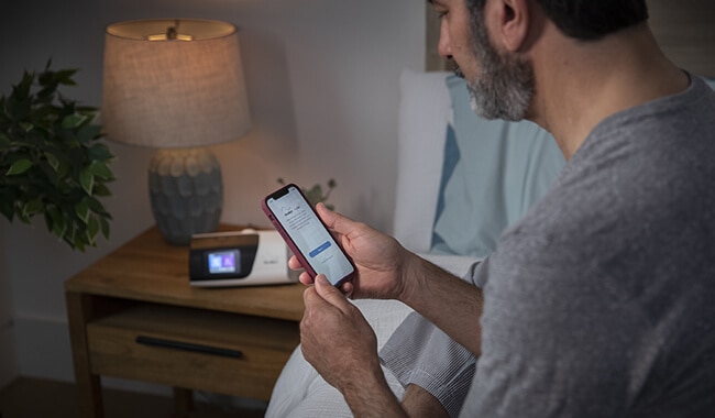 CPAP-patient-using-personal-therapy-assistant-in-myair-app-by-resmed-2